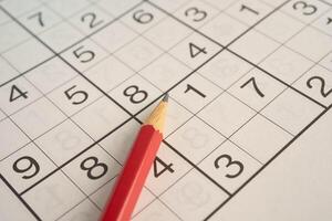 Sudoku puzzle, game to play for keep you brain younger for developing Alzheimer disease in photo