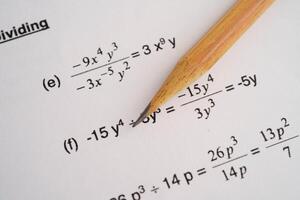 Pencil on mathematic formula exercise test paper in educatio photo