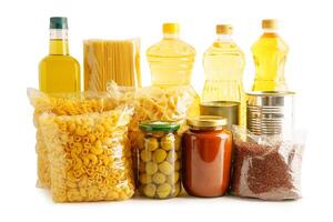 Foodstuffs in donation box isolated on white background with clipping path for volunteer to help photo