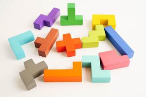 Logical thinking and problem solving problem solution creative business, wooden puzzle geometric block photo