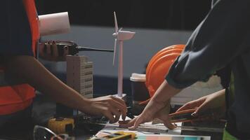 Two people working on a project together video