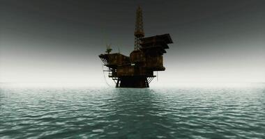 Abandoned oil rig in open water during overcast weather video