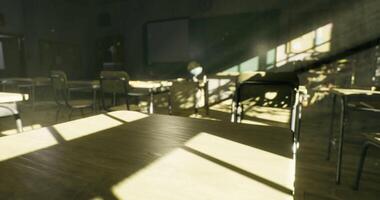 Empty classroom with sunlight streaming through windows in a school setting video