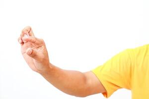 Hand gesture displaying small size concept in front of plain white background photo