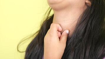 a little girl appears to struggle with a choking feeling while remaining calm. video