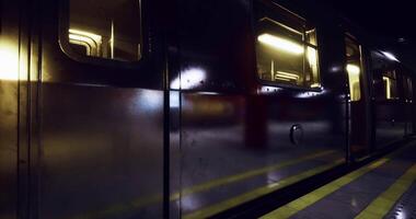Reflections on a quiet subway platform at night with dim lighting video