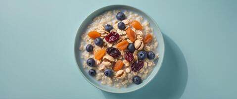 Healthy bowl of oatmeal with dried fruits and nuts promoting diabetes awareness featuring empty space for adding custom text or messages. photo