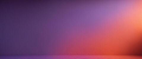 Vibrant and colorful backdrop with gradient textured wall transitioning from purple to orange photo