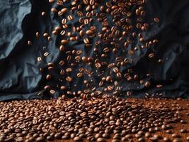 Coffee beans falling into the ground that is dark brown with a black background. photo