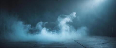 Mysterious blue mist envelops an empty stage in a dimly lit atmosphere creating an eerie ambiance. photo