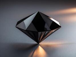 A Black Diamond Shaped Object Rests on a Surface. photo