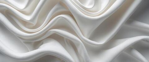 Elegant White Fabric Texture with Smooth Flowing Waves and Curves. photo