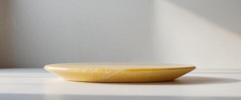 Smooth surface of polished yellow onyx stone creating a beautiful background for various design purposes. photo