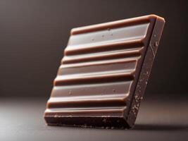 Close up View of Rich Milk Chocolate Bar With Smooth Texture and Shiny Surface photo