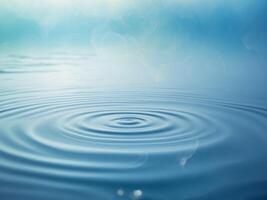 A blurry image of water with a blue background photo