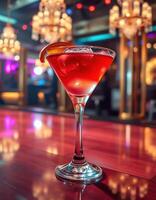 Vibrant cocktail served in a sleek glass on a bar countertop illuminated by colorful lights photo
