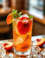 Refreshing summer drink with fresh peach slices and mint on a wooden table in a cozy cafe setting photo