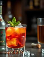 Refreshing cocktail served in a glass with ice and mint on a wooden table in an inviting bar setting photo