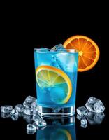 Colorful cocktail garnished with orange and lemon slices on a black background with ice cubes photo