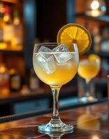 Refreshing cocktail with lemon garnish served in elegant glass at a stylish bar in the evening photo
