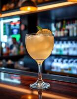Refreshing cocktail served at a modern bar during an evening social gathering with ambient lighting photo