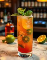 Refreshing cocktail with mint and citrus served on a marble bar counter in a stylish lounge photo