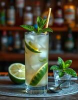 Refreshing mojito cocktail with mint and lime served at a bar during a lively evening photo