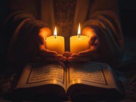 Illuminated soft candlelight hands are raised in Dua while open Quran sits in foreground reflecting spirit of unity and devotion during Eid al Fitr celebrations photo
