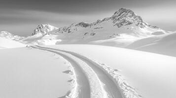Fresh ski tracks trace captivating pattern in untouched snow showcasing swift movement of biathlete against backdrop of majestic mountains photo
