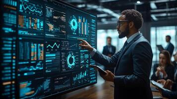 Colleagues engage in business meeting as professional points key data trends on large screen. Financial metrics and AI insights are prominently displayed fostering collaboration photo