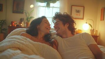 In cozy bedroom illuminated bedside lamp two figures lie blanket sharing laughter and soft whispers. Their closeness and warmth create intimate atmosphere photo