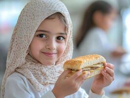 Muslim child joyfully exchanges sandwich classmate reflecting spirit of sharing and friendship during Eid celebration in warm inviting setting photo