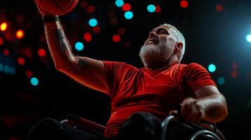 Hispanic amputee in dynamic pose plays wheelchair basketball while grasping chair and reaching for ball prosthetic arm amid colorful gymnasium lighting photo