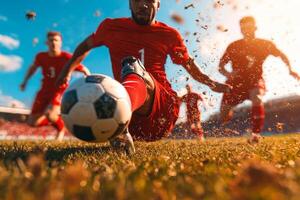 talented African American soccer player kicks ball mid air while playing on grassy field during bright midday sunshine teammates in background photo