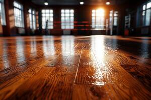 Ceiling lights create dramatic shadows over empty boxing ring in dimly lit space. polished wooden floor reflects soft glow enhancing moody atmosphere photo