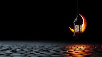 A beautifully illuminated lantern casting shadows on a cobblestone surface in a dark setting photo