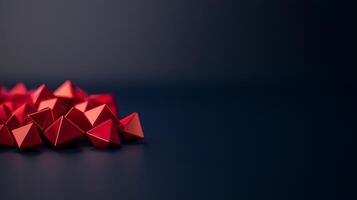 A pile of red triangles on a dark background photo