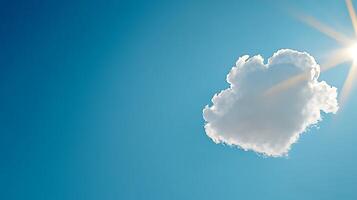 A cloud with the sun shining through it photo