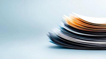 Stack of papers on a blue background photo