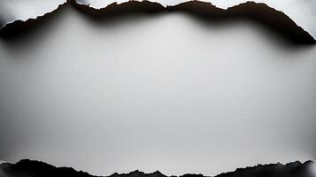 A hole in the paper with a hole in the middle photo