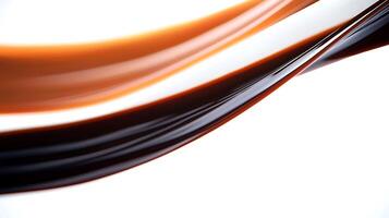 A close up of a liquid flowing in a white background photo