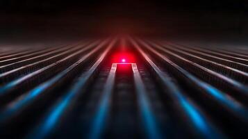 A red light is shining on a dark background photo