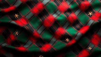 Close-up of a textured tartan fabric featuring red, green, and black patterns with decorative stars photo