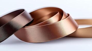 Three different colored ribbon on a white surface photo