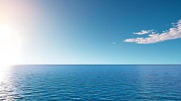 A blue ocean with a sun shining over it photo