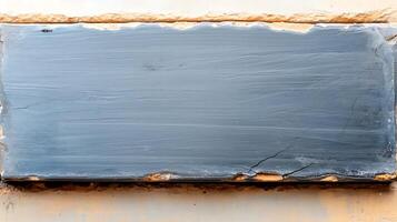 A blackboard with a piece of wood on it photo