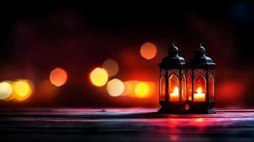 Two lanterns on a table with a blurred background photo