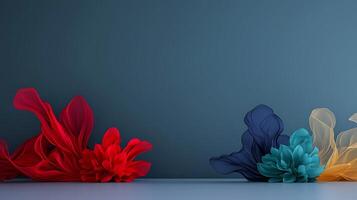 Colorful flowers on a table with a blue background photo