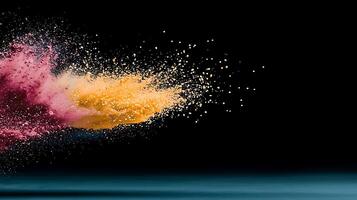 Colorful powder explosion on black background photo