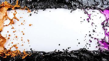 A white frame with paint splashes and ink photo